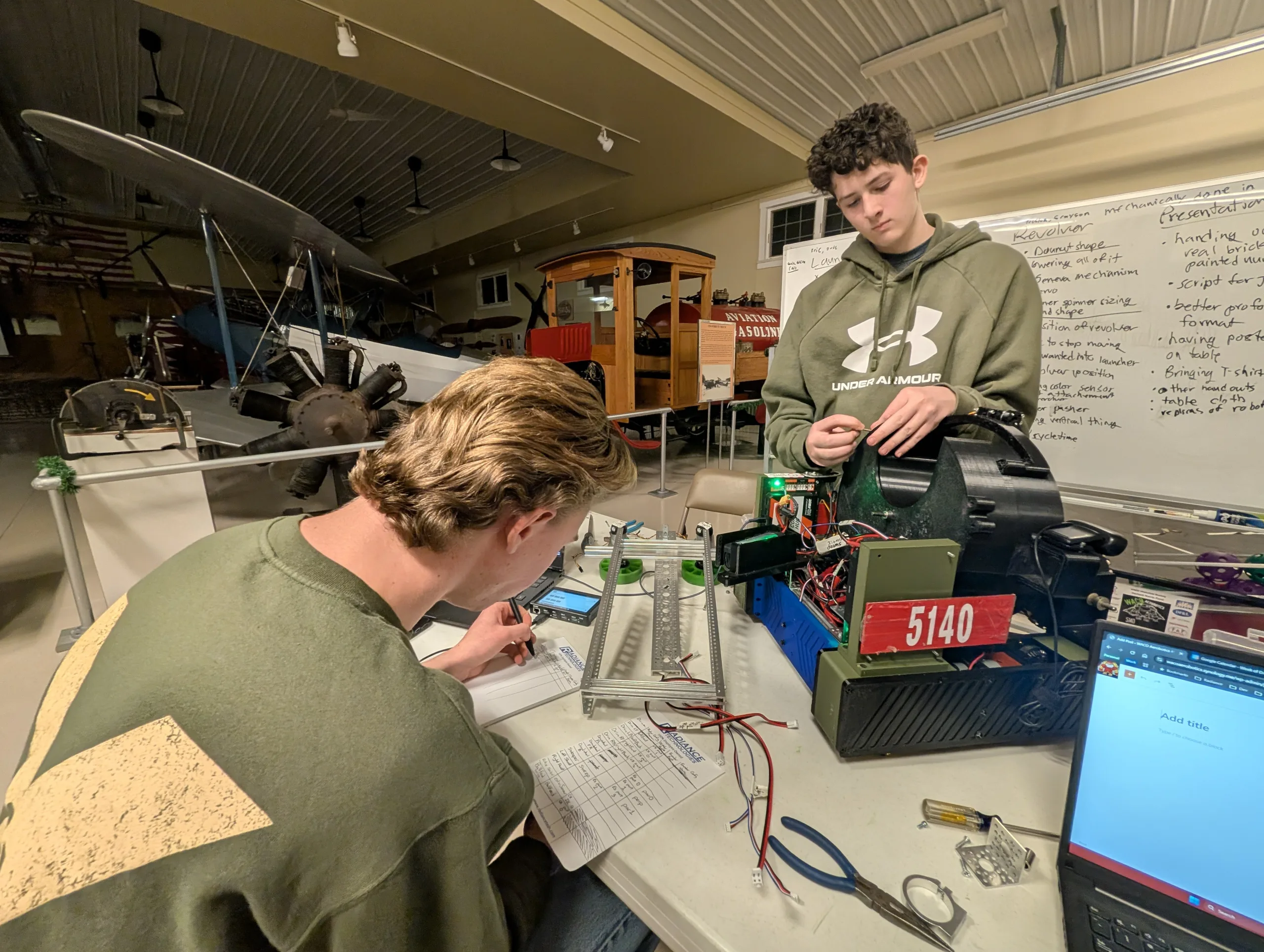 Gavin and Asher working on disassembly